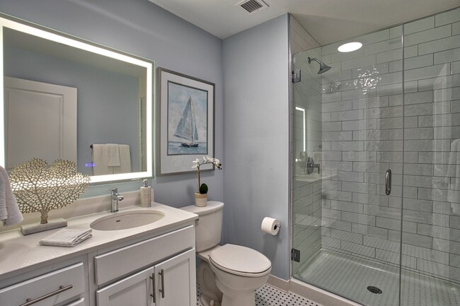 Basket weave bathroom tile flooring and standup showers