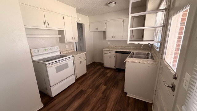 Photo - The Carport Cottage: Charming 3-Bedroom Brick Home Available Now.