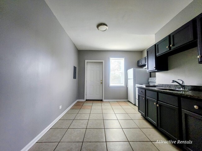 Photo - 1465 E 68th St Unit 2