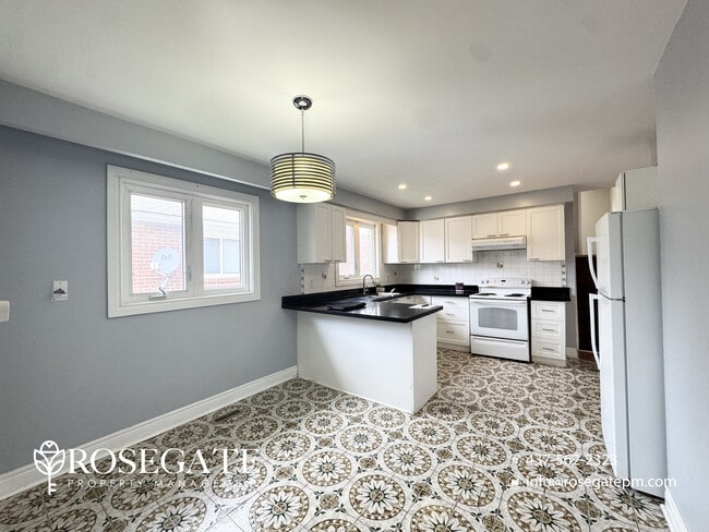 Photo - Spacious 3-Bedroom Main Level Apartment with Private Balcony – Brampton Unit 1