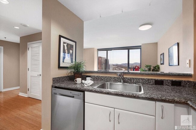 Photo - Spacious One-Bedroom Elegance in a Luxury Doorman Building with EV Parking Unidad 741