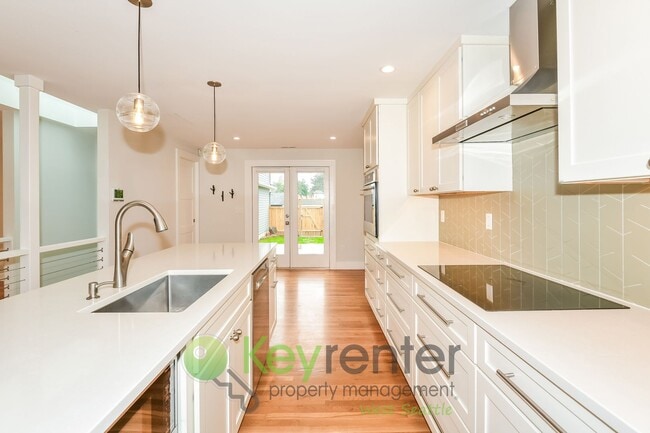 Photo - Stylish Four Bedroom Home with Hardwood Floors and Outdoor Space