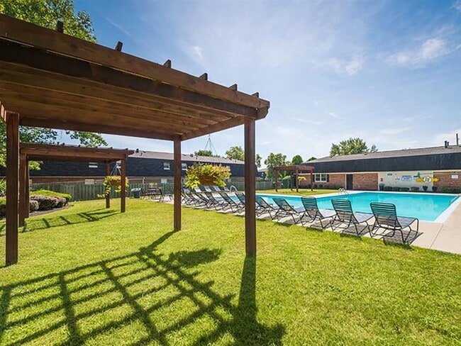 Relax Poolside Underneath the Shade Arbors