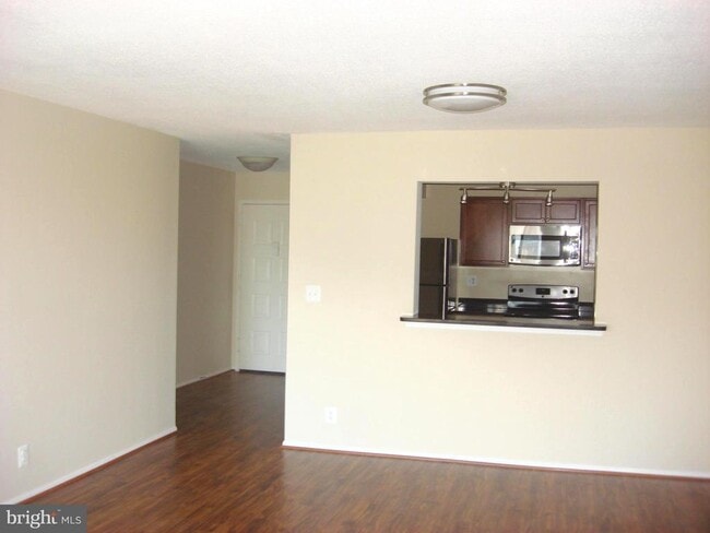 Building Photo - 8340 Greensboro Dr Unit 516