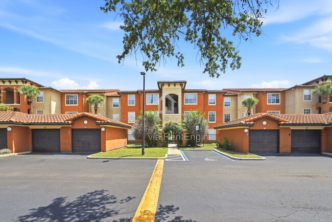 Building Photo - 5572 Metrowest Blvd Unit 5-304