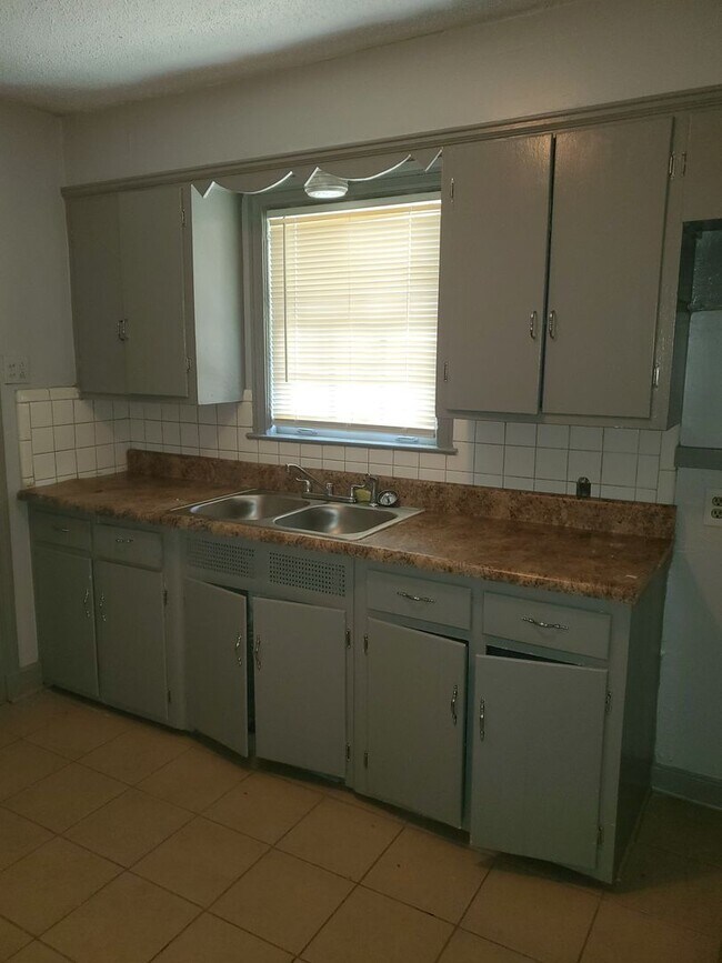 Photo - 4 Success is offering this beautiful 2 bedroom 1 bath with formal dining. The home features hardw...