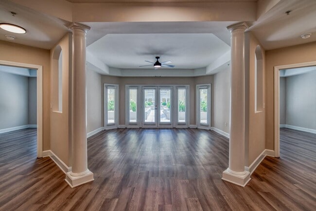 Unique living room layout with large windows that offer an abundance of light