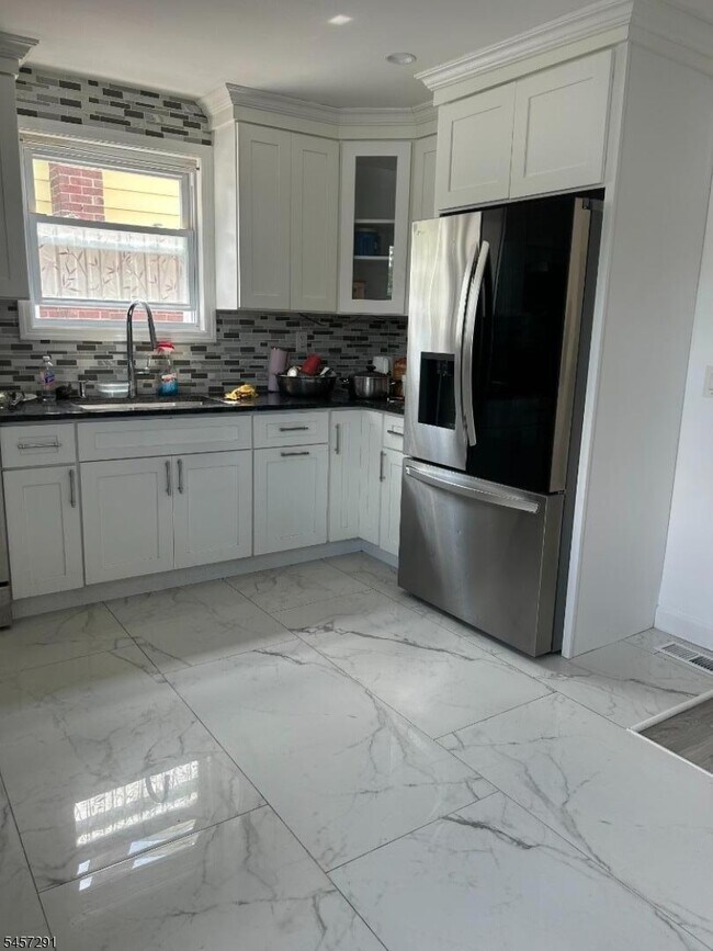 311-317 E 26th St