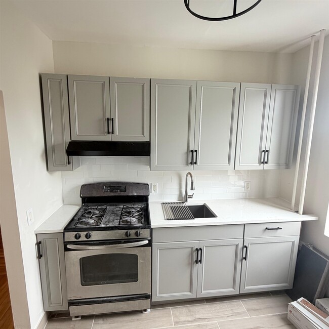 Building Photo - 7111 Palisade Ave Unit B2