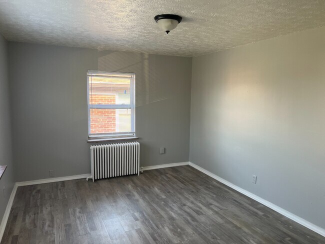 Photo - Spacious, Newly Updated 1-Bed Near UC & Downtown — Off-Street Parking, Radiant Heat Unit 4