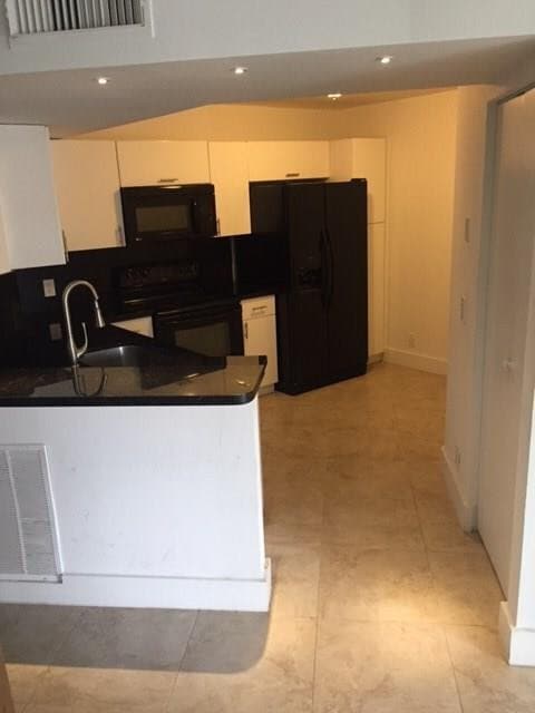 Photo - 8761 Wiles Rd Unit 103