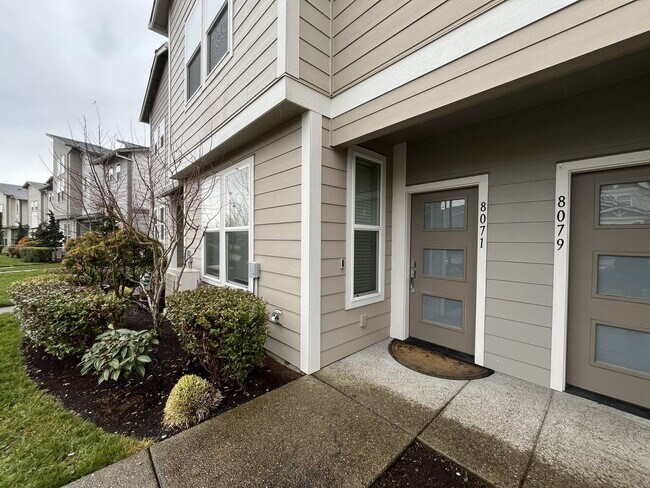 Photo - Stylish Two-Story Living with Fireplace, Island Kitchen & Private Primary Suite