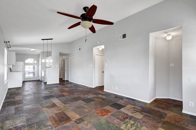 Photo - Carpet-Free Home with High Ceilings & Outdoor Retreat
