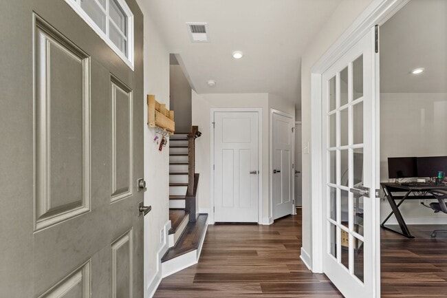 Photo - Luxurious three-story townhome with owner's suite and high-end finishes