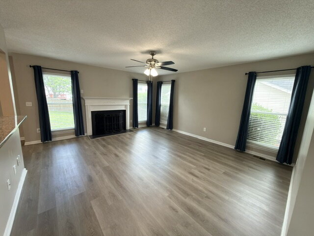 Photo - Spacious 4BR Home with Fenced Yard, Community Pool & 2-Car Garage
