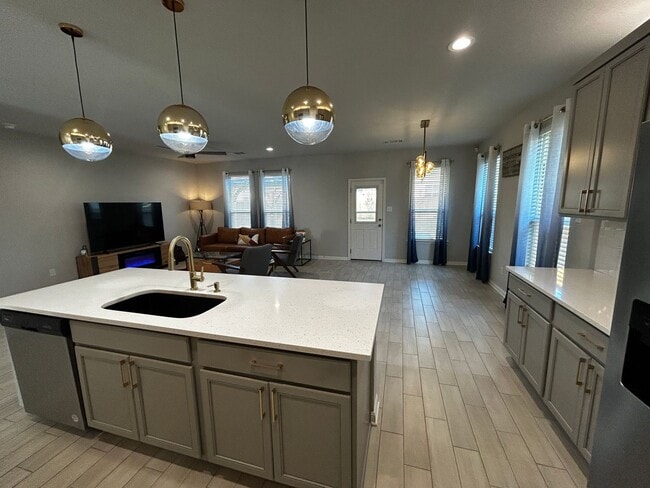 Photo - 3BR/2BA single-family home with fenced yard and attached garage in Jarrell, TX.