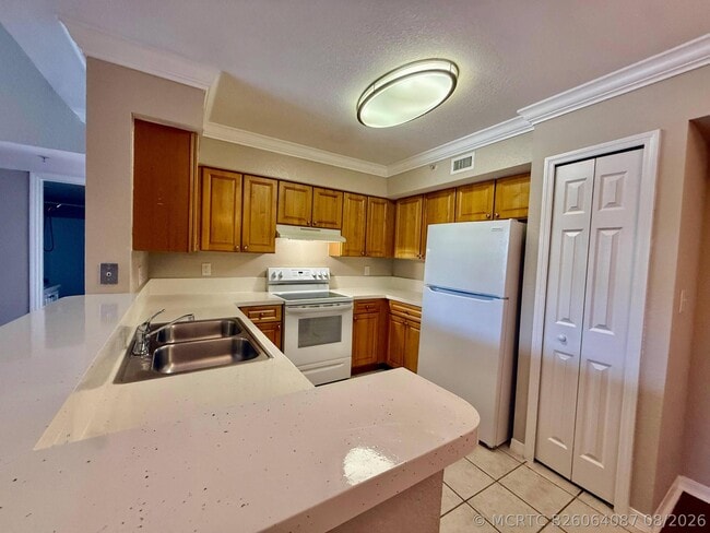 Building Photo - 15155 Michelangelo Blvd Unit 208