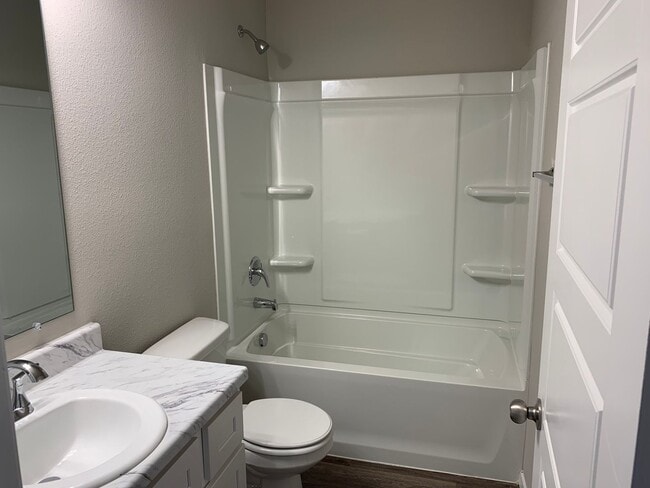 Photo - This well-designed 4-bedroom home has a split floor plan that gives the feeling of space.