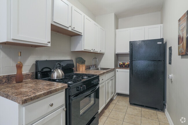 1 BR, 1 BA - Kitchen - Wyndham Apartments