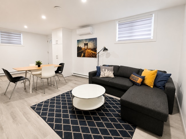 Open living areas - 203 Rue Dollard-Des Ormeaux Unit Furnished 2BR / 1BA Apartment