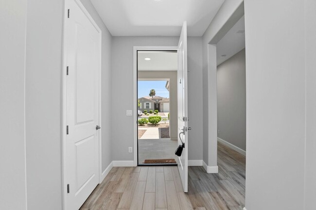 Photo - Luxury Kitchen + 3 Bed & Den/Office in Azure Canyon | Quartz, Gas Cooktop & More
