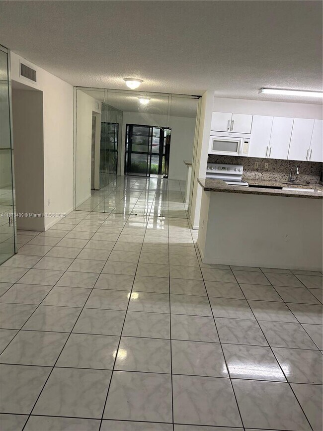 Photo - 911 NE 199th St Unit 104-14