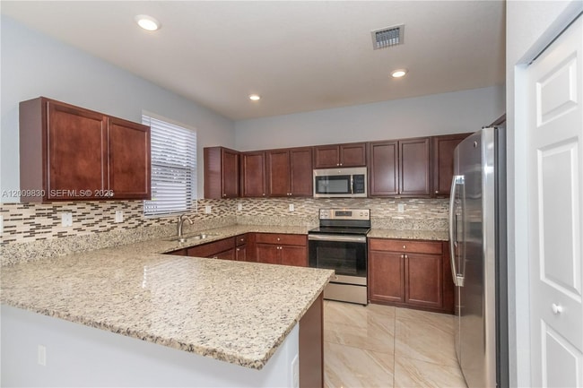 Building Photo - 3364 W 103rd Ter Unit 0