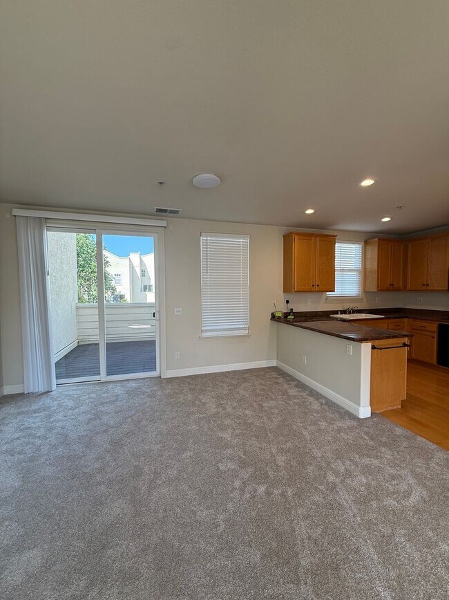 Photo - 2 bedroom 2.5 Bathroom Windsor Town Green Condo with carpet and A/C