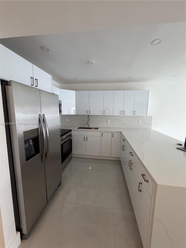 Building Photo - 6070 W 19th Ave Unit 315