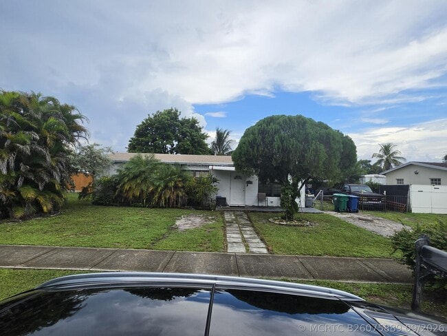1280 NE 214th St
