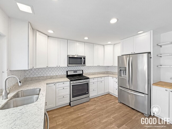 Photo - Amazing 4 Bedroom Home with Attached Garage and Updates Throughout!