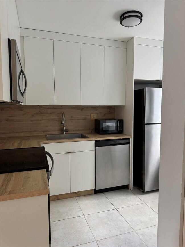 Photo - 313 Gardens Dr Unit 104