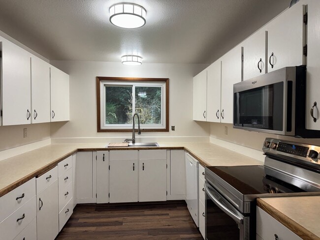 Photo - Cozy one story home on beautiful close to town acreage.