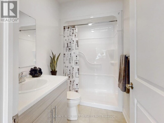 Photo - 77 William St N Unité 208