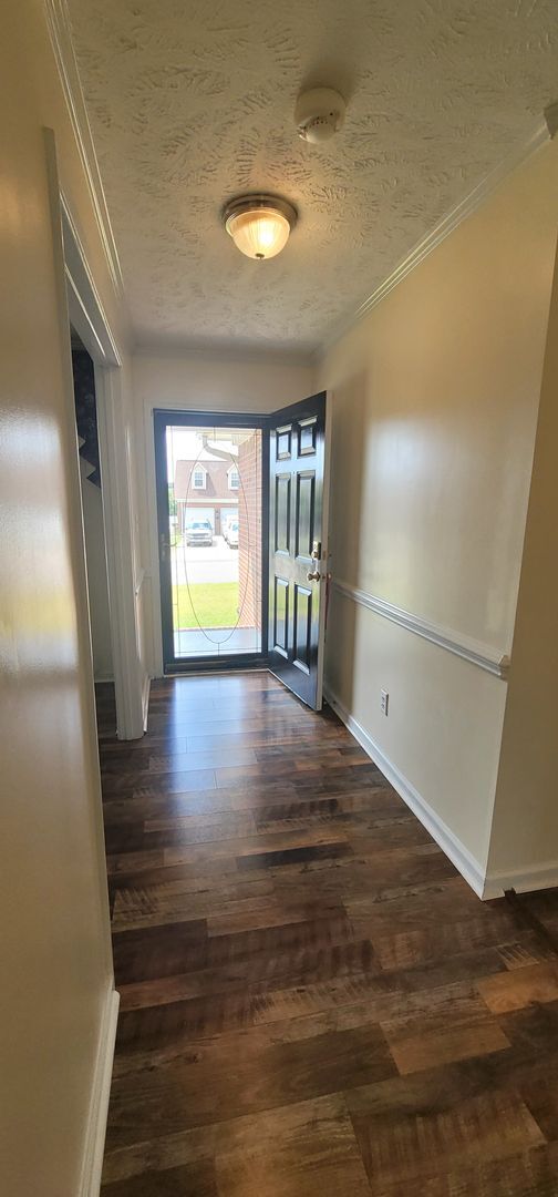 Photo - Beautiful 3 Bedro Brick Ranch Home w/ Bonus Room- Minutes from Interstate and Close to Shopping.