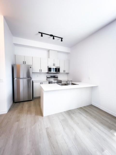 McGee Apartments - McGee Apartments