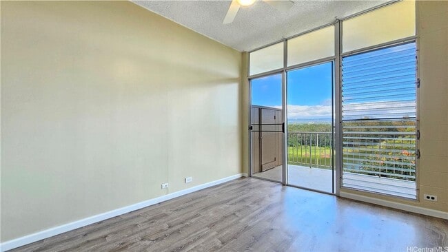 Photo - 2 Bed, 1 Bath Top-Floor Corner Condo with Lake Views