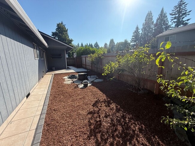 Photo - Spacious 3BD/2BA Home with Two-Car Garage,...