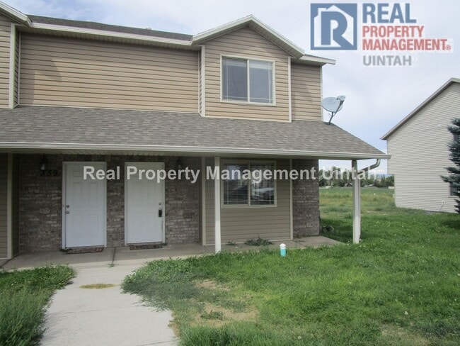 Building Photo - Real Property Management Uintah is currently renting this 3 bed, 1.5 bath twin home available in ...