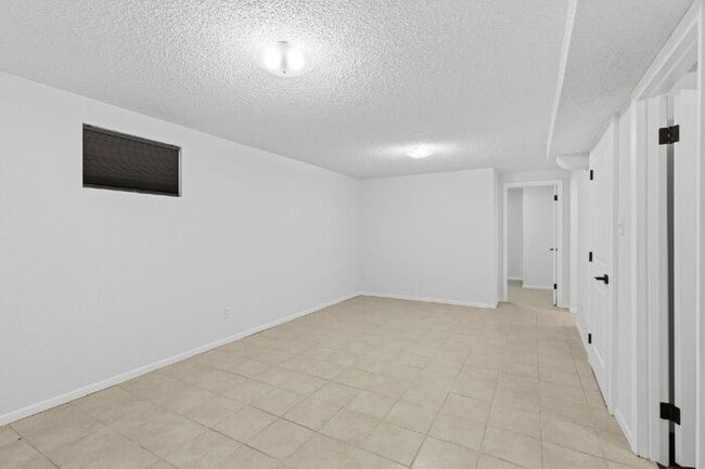 Photo - Charming Basement Apartment with Modern Finishes and Flat-Rate Utilities