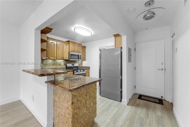 Photo - 7840 Camino Real Unit P-107