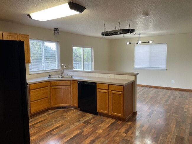 Photo - Beautiful 3 Bed 2.5 Bath Home in Milliken, Huge Corner Lot, Fenced Yard & Unfinished Basement