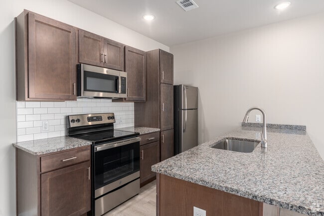 1BR, 1BA - 694SF - Kithcen - Signature Flats at Hershey