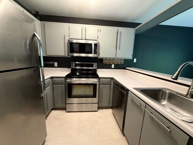 Photo - Updated 2BD/2BA Condo with Green Space Views & Covered Parking