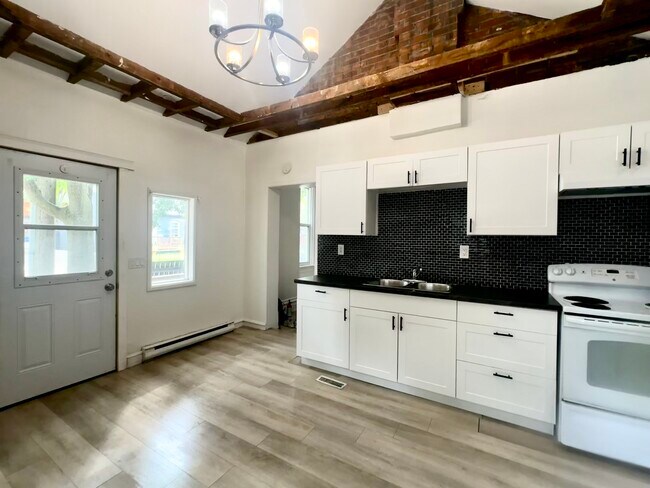 Photo - Main Floor 2 bedroom with Parking Unité 1