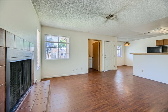 Photo - 2nd Story 2-Bed Condo with Tile Fireplace Unit D