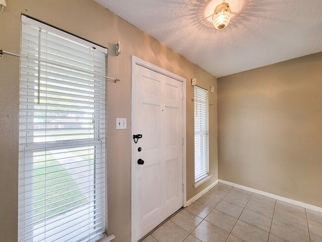 Photo - This spacious 4-bedroom, 2-bathroom lease home in Baytown, Texas, offers the perfect blend of com...