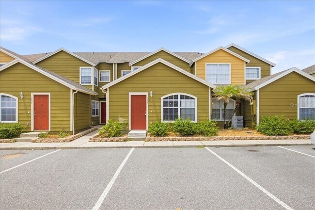 Building Photo - 713 Washington Palm Loop Unit Front