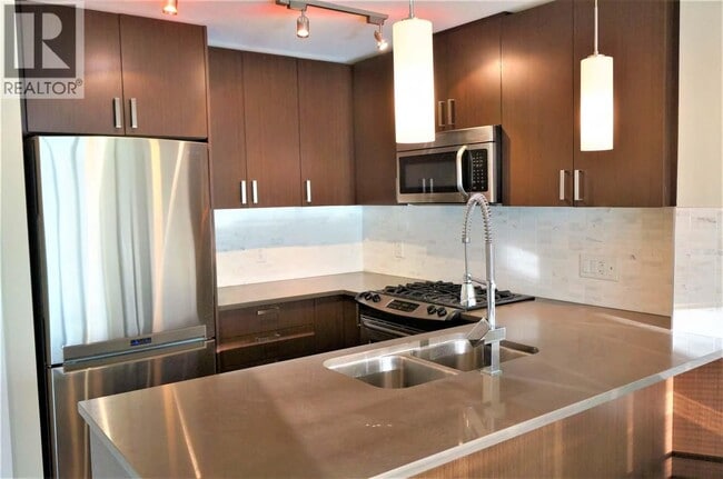 Photo - 7117 Elmbridge Way Unité 705