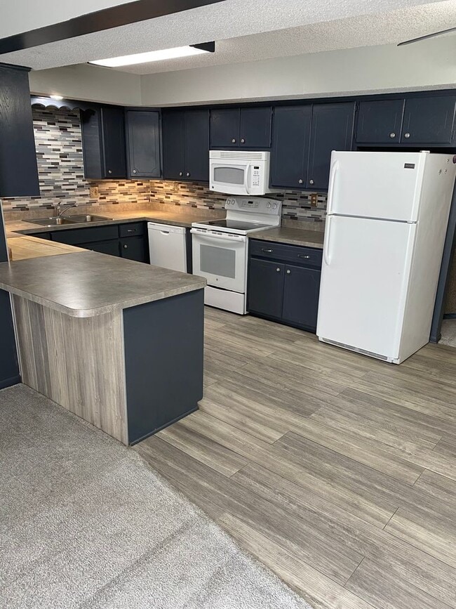 Photo - Fully Updated 3 Bedroom 3 Bath Townhouse with 2 Stall Attatched Garage